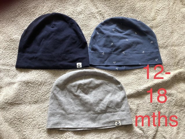 Preview of the first image of Set of 3 baby hats 3 different colours.