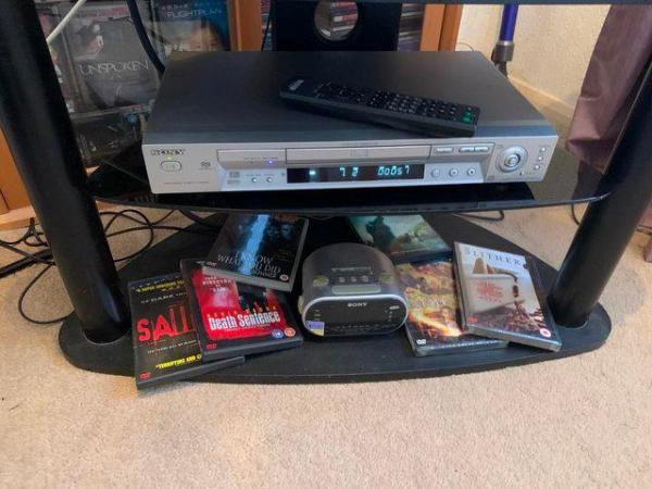Image 1 of television dvd player clock.dvds and stand