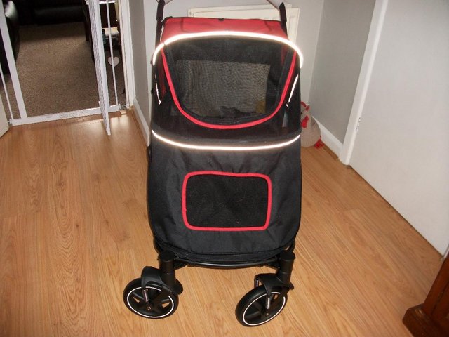 Preview of the first image of Dog Stroller which has never been used.