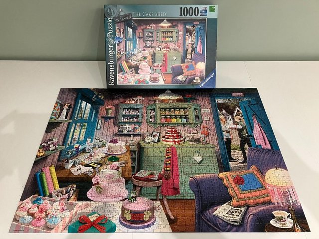Preview of the first image of Ravensburger 1000 piece jigsaw titled The Cake Shop..