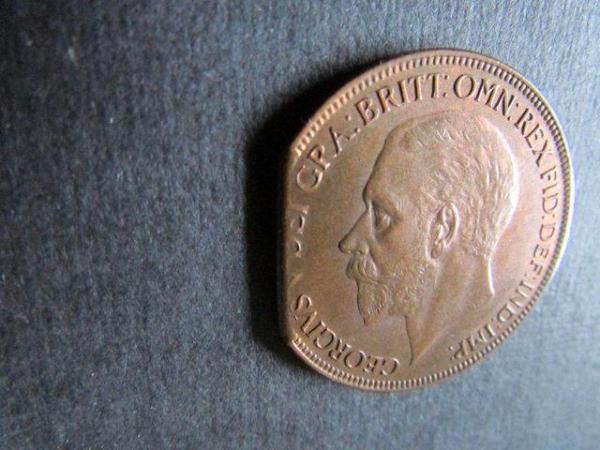 Image 2 of 1927 GEORGE V ONE PENNY WITH PART OF SIDE MISSING.