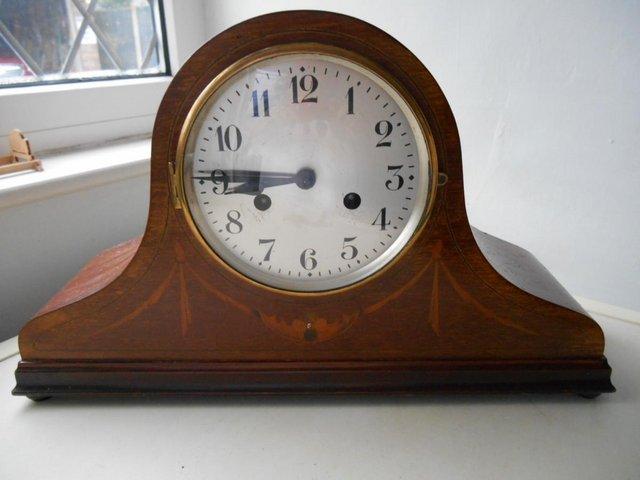 Preview of the first image of Napoleon Hat Inlaid Mantle Clock.