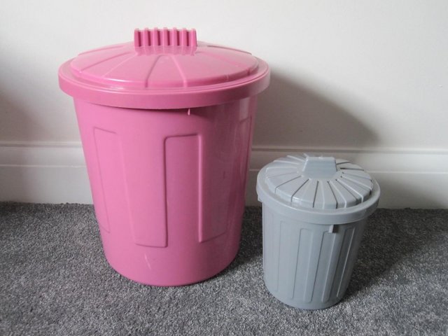 Preview of the first image of Two bins 1 pink and 1 grey.