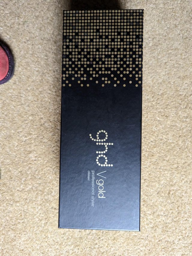 Preview of the first image of As New ghd v Gold professional styler hair straightners.