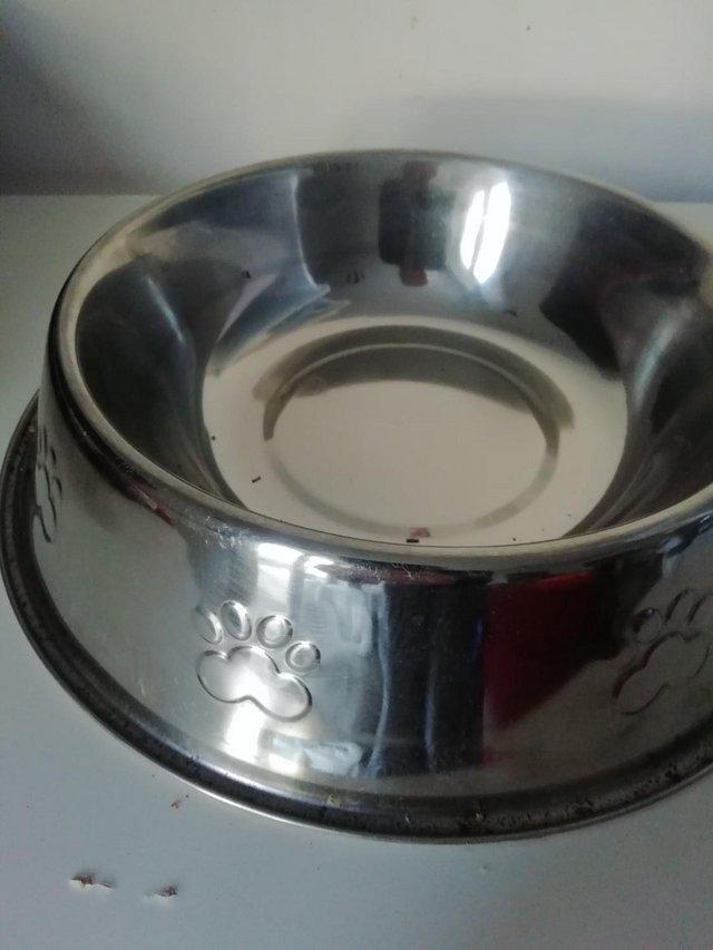 Preview of the first image of Dog bowl bone detail stainless steel.