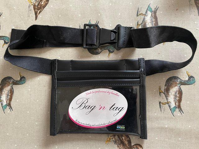 Preview of the first image of Bag n Tag, dog show number holder and bait bag.
