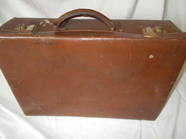 Preview of the first image of 1942 N.S.W.G. Naval Special Warfare Group Leather suitcase.