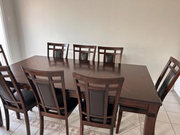 Image 1 of Extendable Dining table with 8 chairs