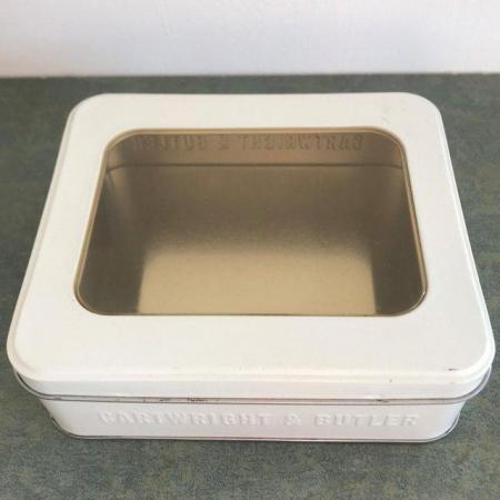 Image 1 of Cream Cartwright & Butler tin, hinged lid with 'window'.