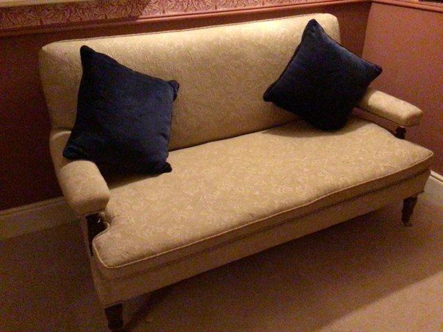 Preview of the first image of Creamy gold antique French style sofa..