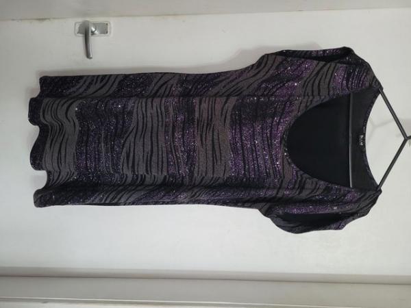 Image 2 of black and grey with purple sparkles tunic top. loose fitting