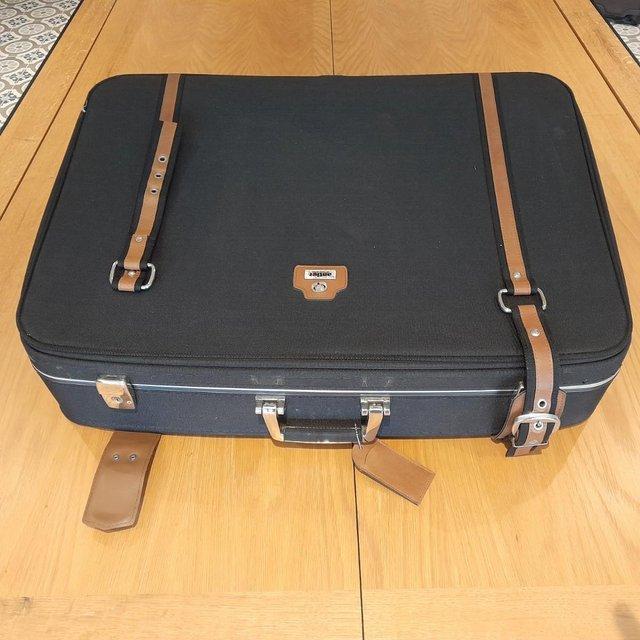 Preview of the first image of Large Vintage Antler Suitcase with Wheels.