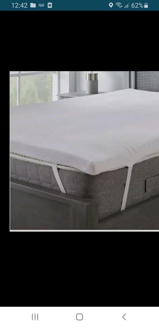 Preview of the first image of Dunelm double bed memory foam Mattress topper.