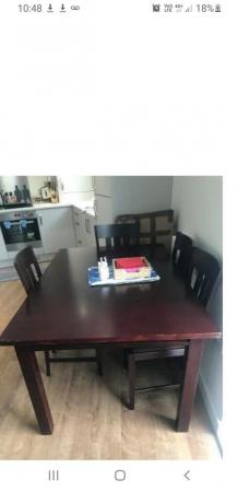 Image 1 of solid Oak extendable 6 seater dining table and chairs