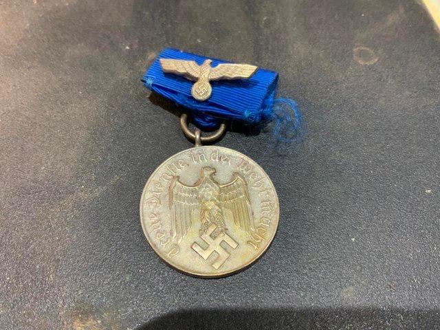 Preview of the first image of German soldiers 4 years service medal.