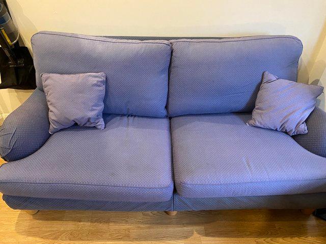 Preview of the first image of Blue 2 seater Multiyork sofa and cushions.