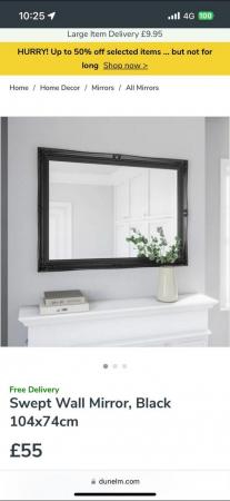 Image 1 of Swept Dunelm wall mirror in black