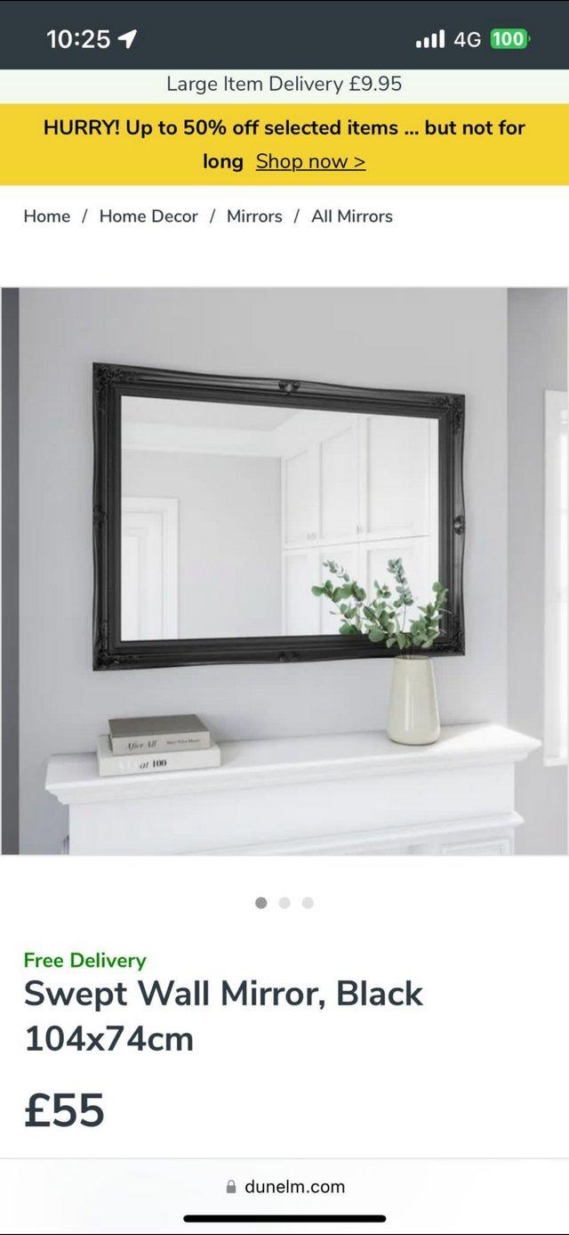 Preview of the first image of Swept Dunelm wall mirror in black.