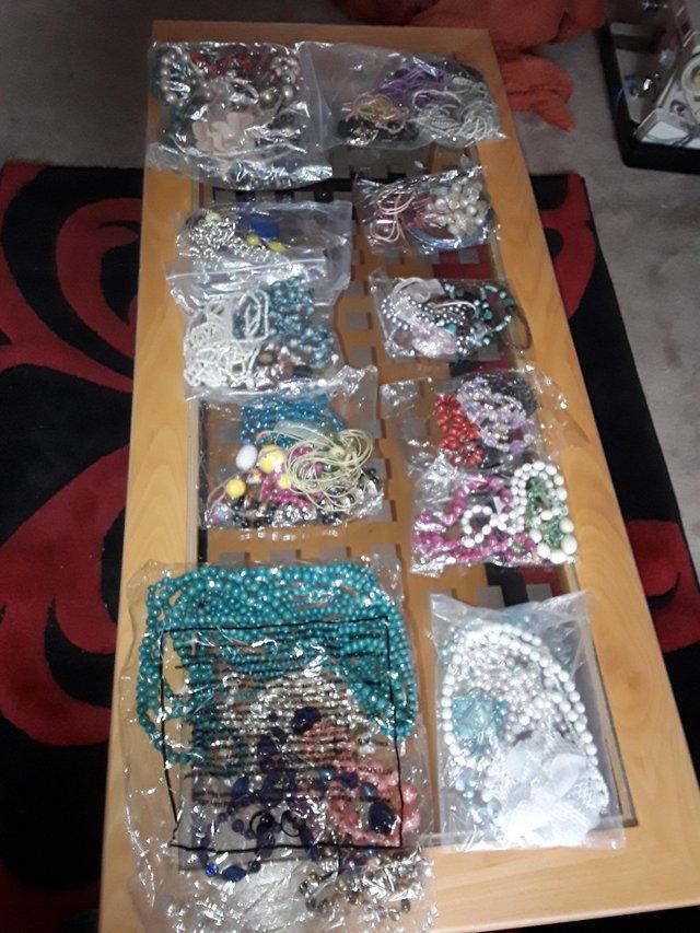 Preview of the first image of An array of selection packs of costume jewellery.