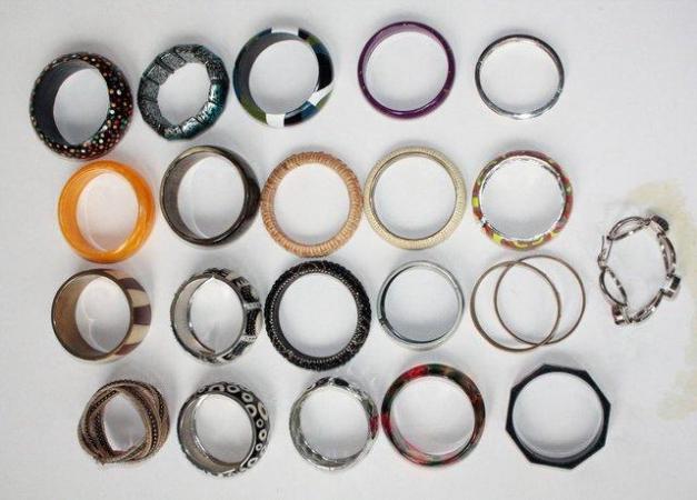 Image 2 of Women's 22 Assorted Bangles. Made of assorted materials.