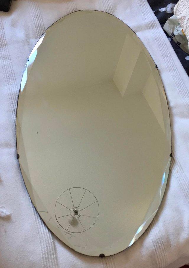 Preview of the first image of Bevelled vintage wall mirror..