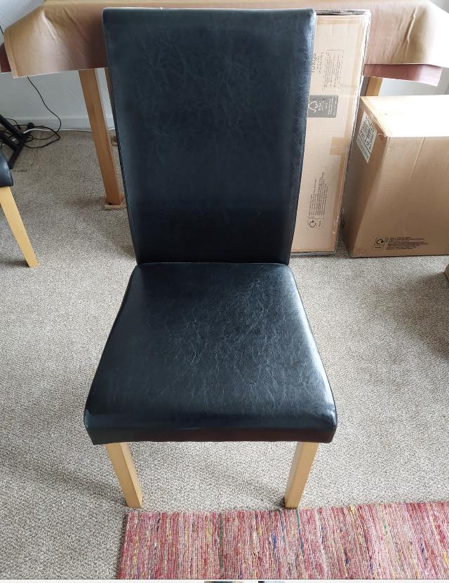 Preview of the first image of Dining chairs in black as new.