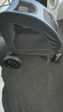 Image 4 of Dog stroller.blue with black net.