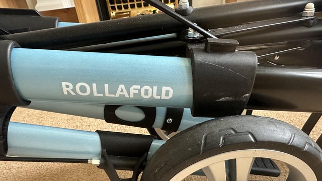 Image 1 of Rollafold Walker with seat & Brakes. Hardly used