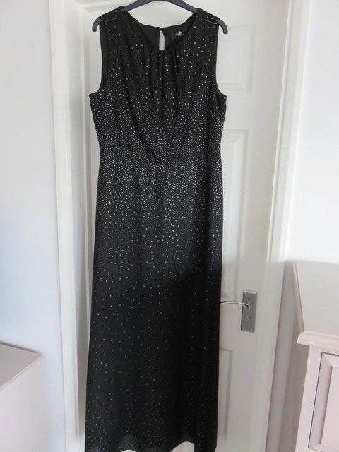 Preview of the first image of Wallis black/silver full length dress in size 14.