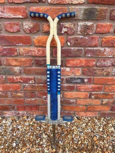 Preview of the first image of Metal spring pogo stick - decent condition.