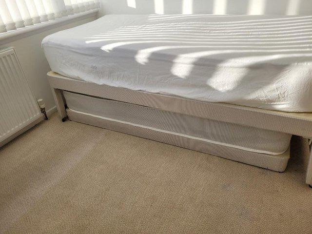 Preview of the first image of Guest bed with headboard, trundle and 1 mattress.