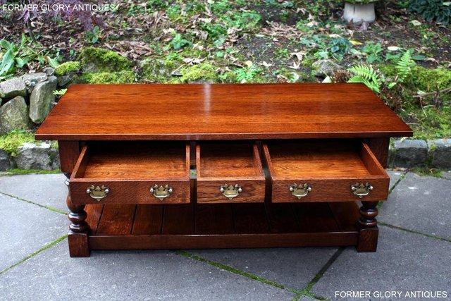 Image 104 of TAYLOR & Co STRESSED OAK THREE DRAWER POTBOARD COFFEE TABLE