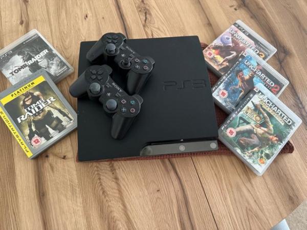 Image 1 of PlayStation 3 Console and two controllers 5 games