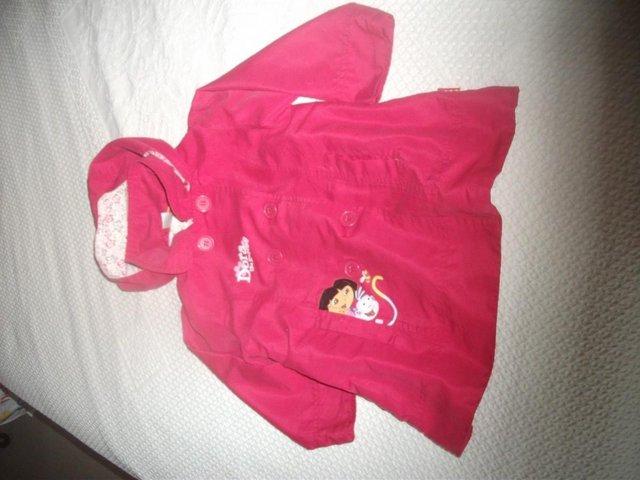 Preview of the first image of Dora the Explorer jacket (preloved) cerise?.