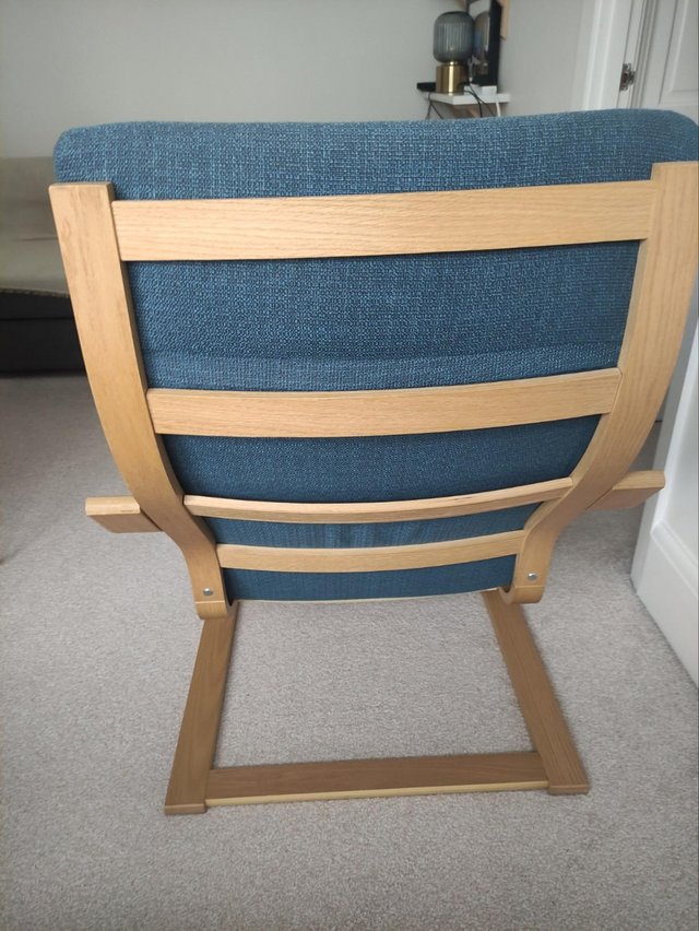 IKEA POANG armchair with blue cushion 