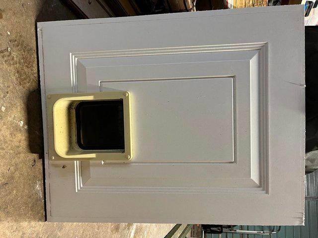 Preview of the first image of Kitchen PVC Door Used Panel with Cat Flap.