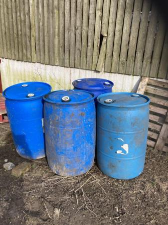 Image 1 of 2 blue barrels remaining.