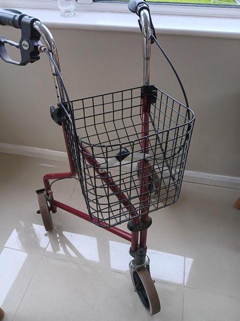 Preview of the first image of Walker 3-wheel folding disability aid..