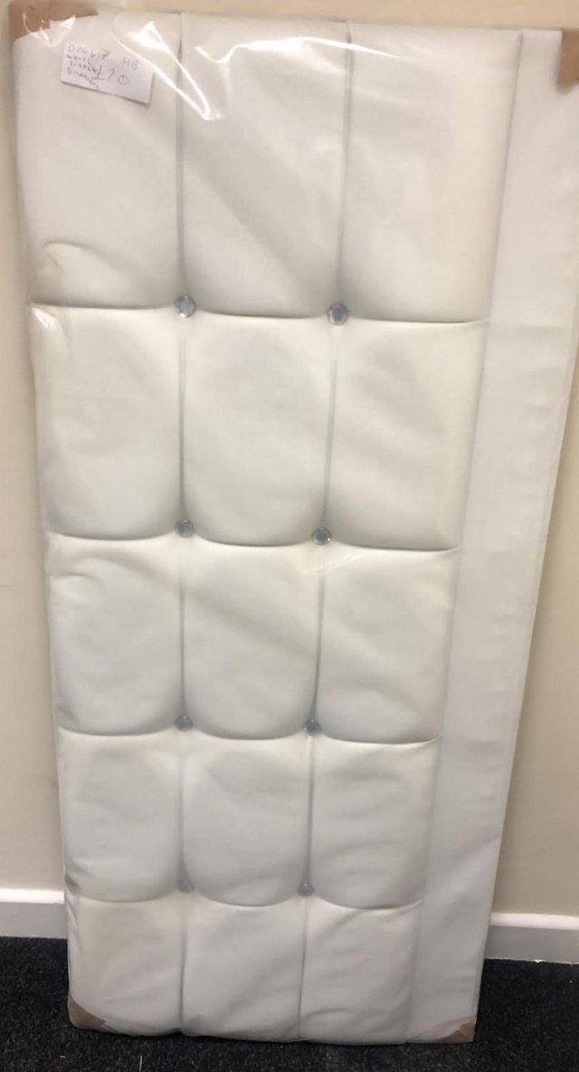Preview of the first image of DOUBLE WHITE LEATHER HEADBOARD WITH DIAMONTES.