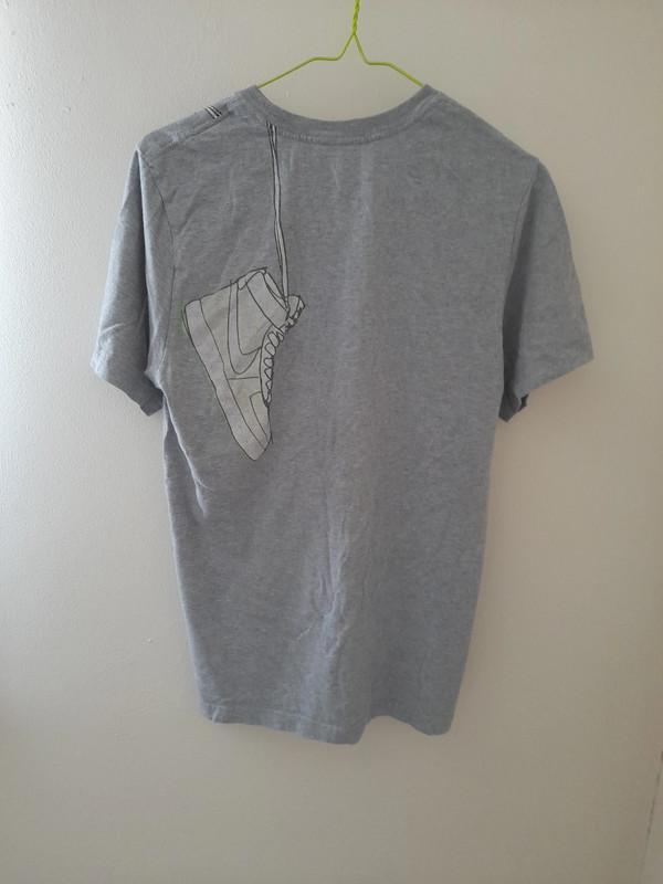 Preview of the first image of Stylish Men's Nike Grey Shirt - Excellent Condition.