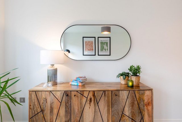 Image 2 of Oblong mirror with black metal frame