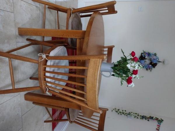 Image 1 of Extendable Solid Oak Round Dining Table with 6 chairs