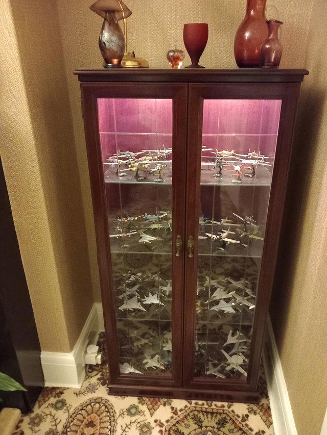 Preview of the first image of Mahogany Display Cabinet with glass shelves.