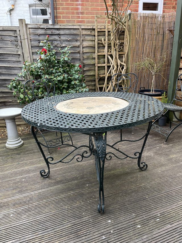 Preview of the first image of Wrought iron garden furniture.
