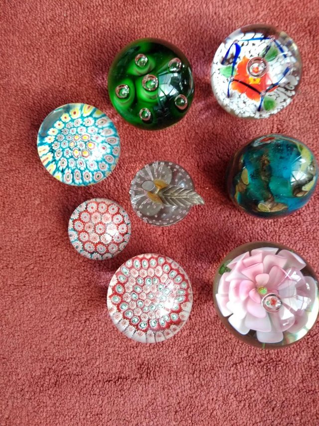 Preview of the first image of 8 Glass Paper Weights various designs.