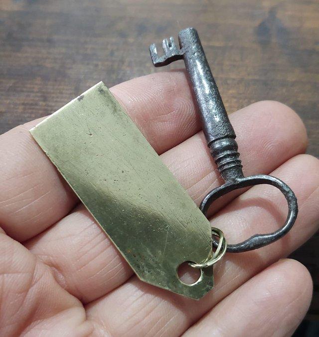 Preview of the first image of Small Brass Key Ring Tab & Key.