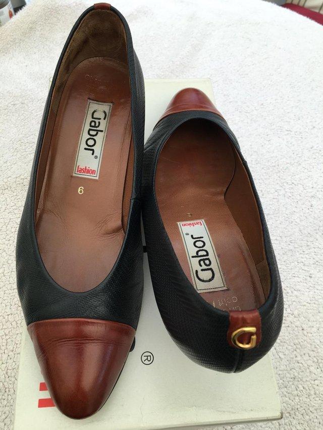 Preview of the first image of Gabor dark Navy/tan ladies court shoe size 6.