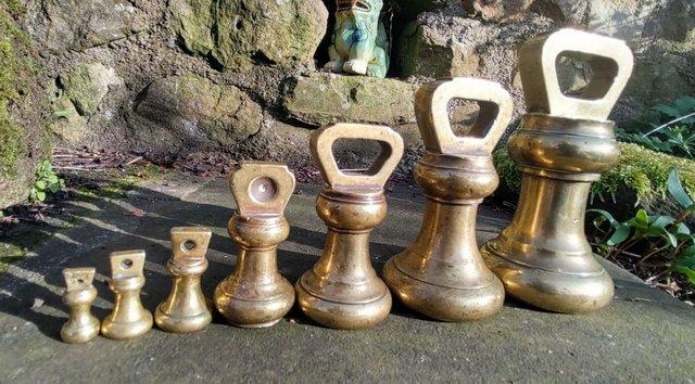 Preview of the first image of Set of 7 Antique Nicely Shaped Brass Weights W&T Avery Ltd.