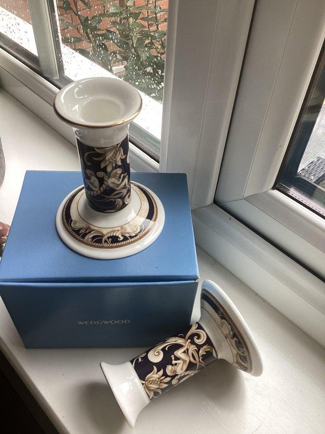 Preview of the first image of Wedgwood bone china  Cornucopia pair of  Candlesticks.