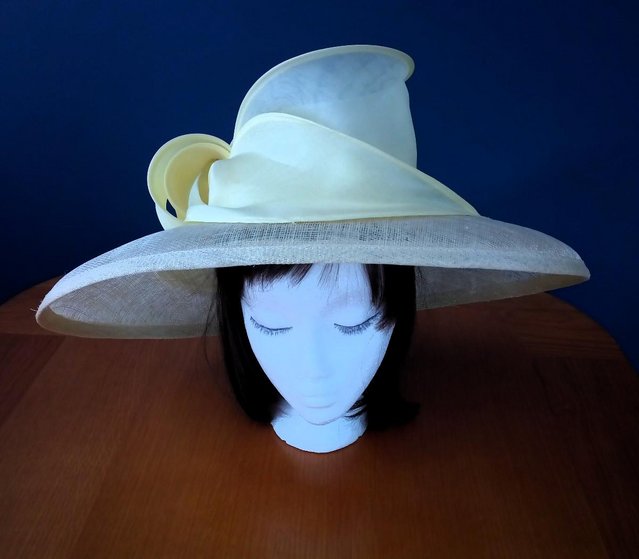 Preview of the first image of Whiteley Made in England Rhiannon Satin Bow Occasion Hat, Ye.